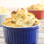 blue dish with shepherds pie, showing crispy potatoes