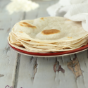 tortillas on red plate