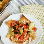 chicken nachos on white plate